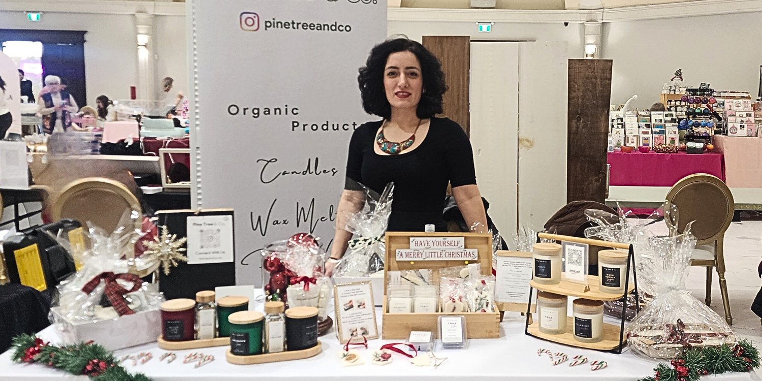 Holiday Market 2025 showcasing Scented Organic Candles. 